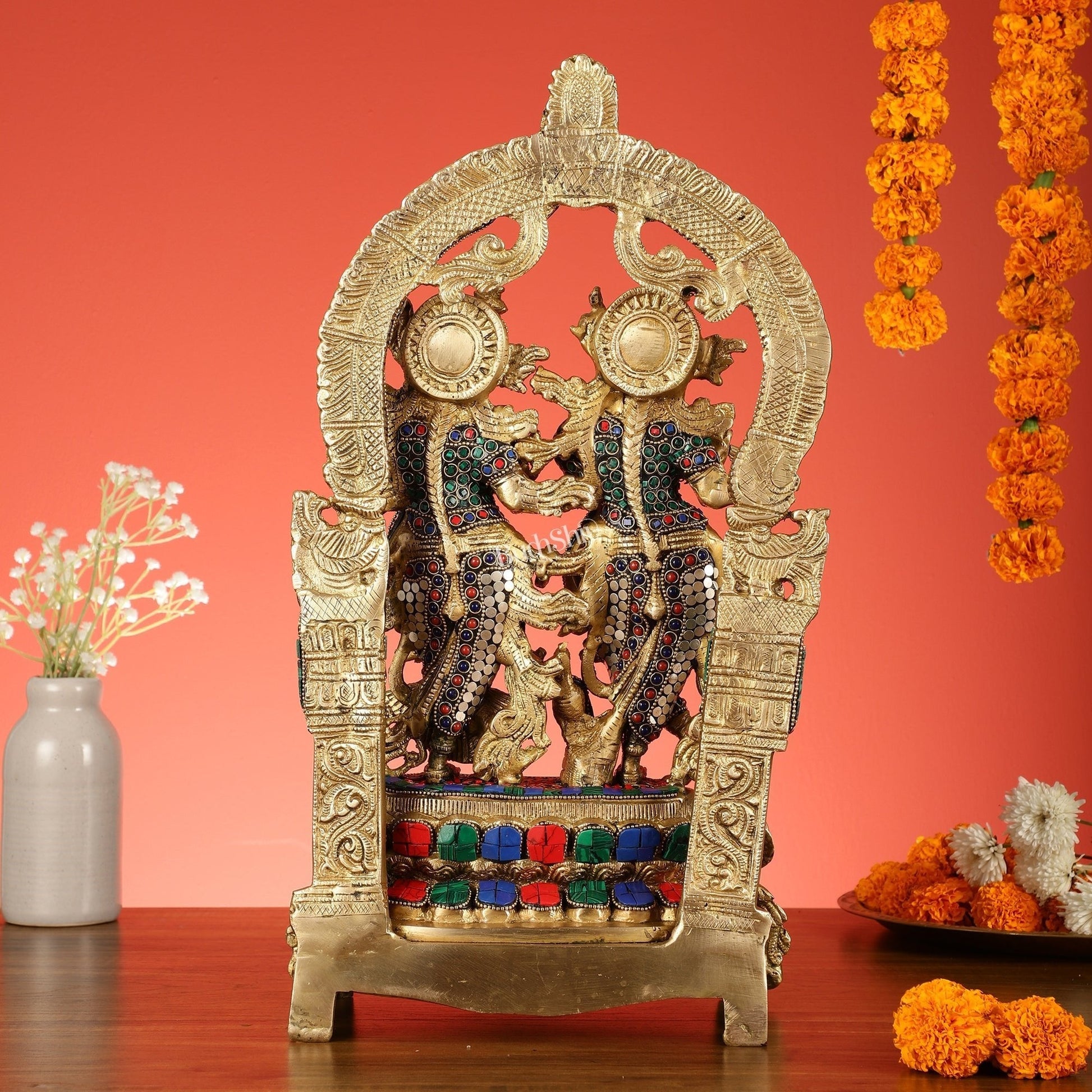 Sama Homes-17 5 inch brass radha krishna idol pair with peacock adorned base