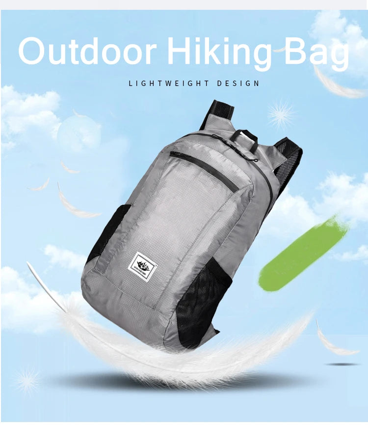 Gray outdoor hiking bag with a brand logo on a blue sky background