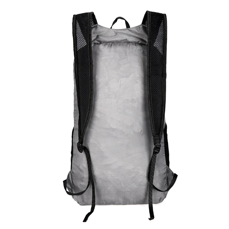 Gray backpack with black straps on a white background