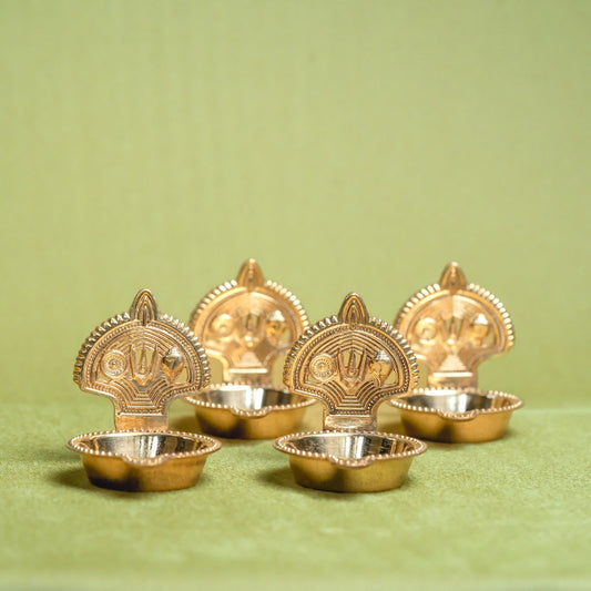 Brass Shankh Chakra Tilak Namah Diya – Set of 4 Handcrafted Traditional Oil Lamps