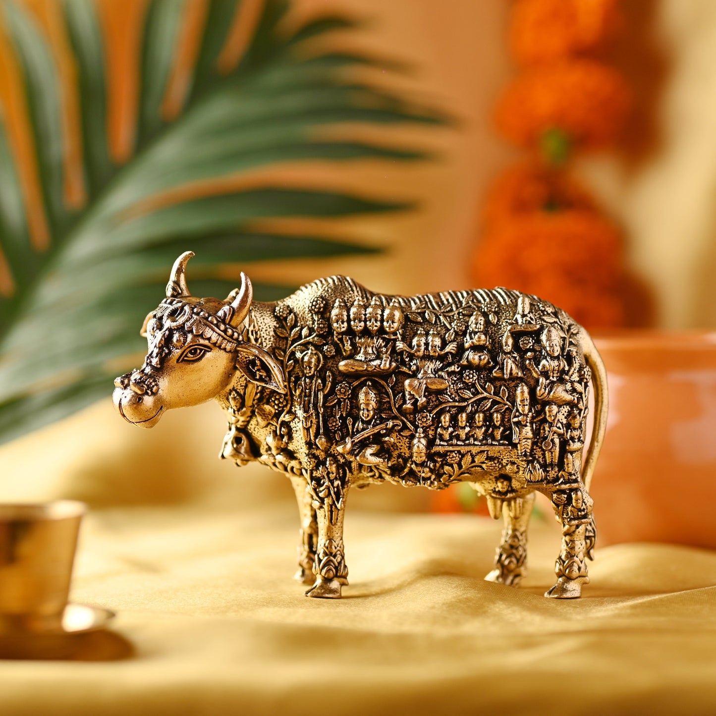 Brass Cow with Engraved Gods and Goddesses – Handcrafted Decor (3 Inch)
