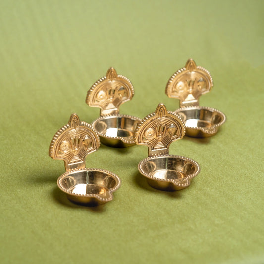 Brass Shankh Chakra Tilak Namah Diya – Set of 4 Handcrafted Traditional Oil Lamps