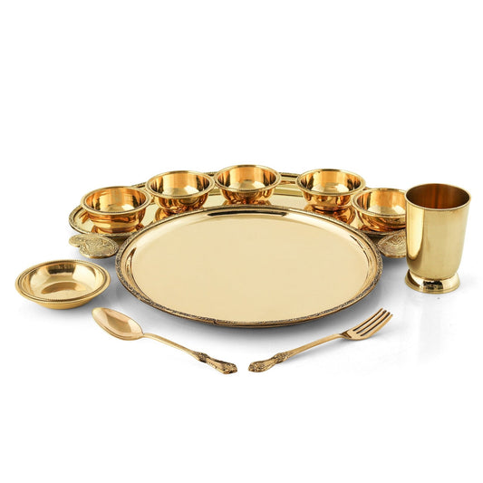 Close-up of a handcrafted brass dinner plate with intricate desig
